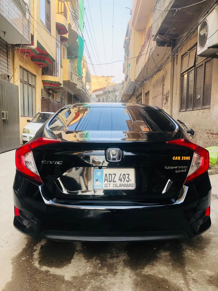 Honda Civic X (Black) rental vehicle in Khanpur, Pakistan